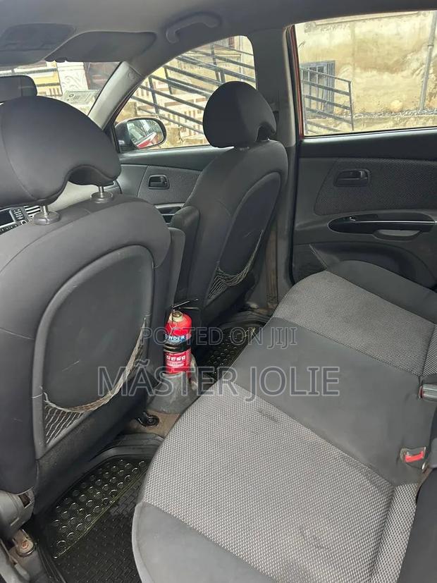 Kia Rio SX 4dr Sedan (1.6L 4cyl 4A) 2010 Red