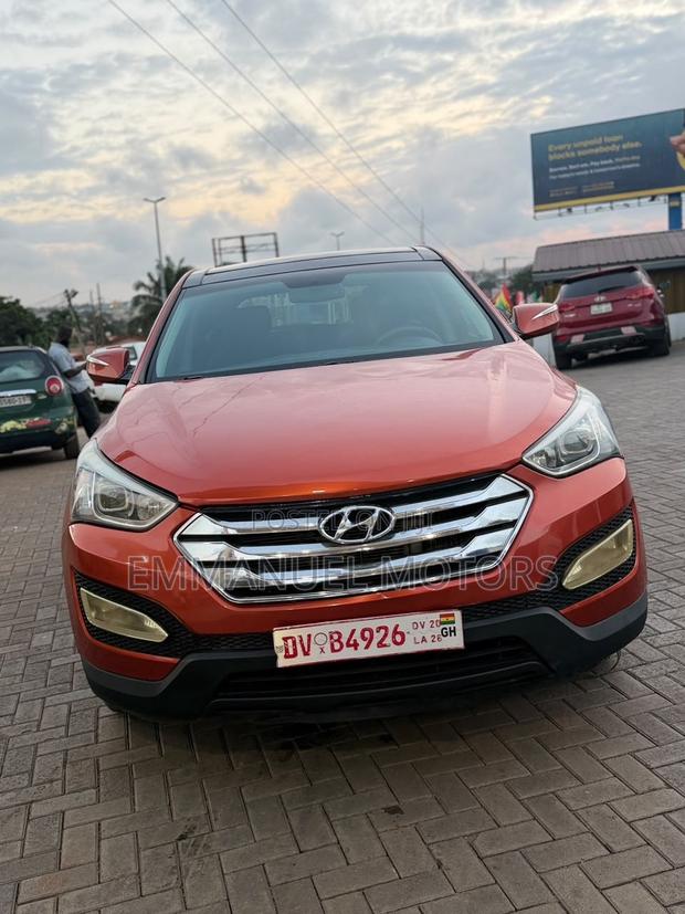 Hyundai Santa Fe Limited 4dr SUV AWD (3.3L 6cyl 6A) 2015 Orange