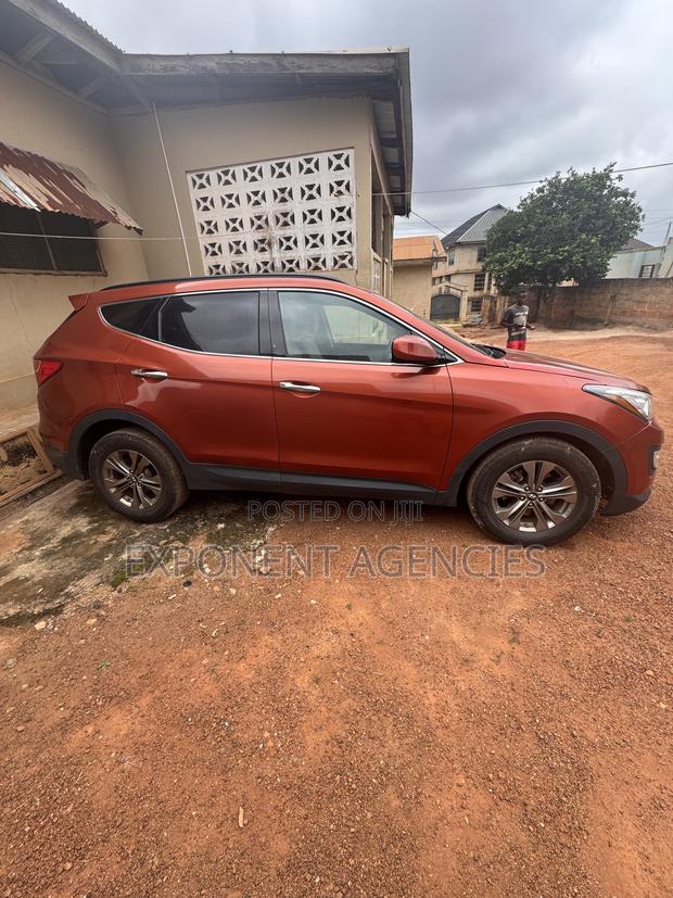 Hyundai Santa Fe Limited 4dr SUV AWD (3.3L 6cyl 6A) 2015 Orange