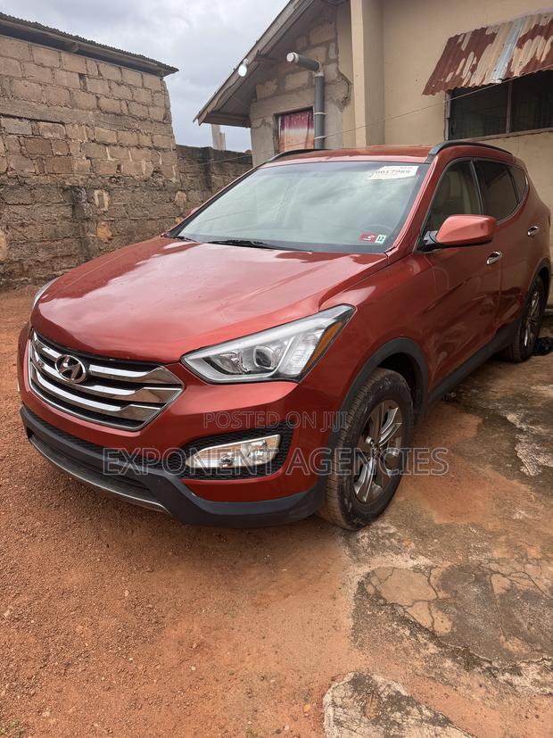 Hyundai Santa Fe Limited 4dr SUV AWD (3.3L 6cyl 6A) 2015 Orange