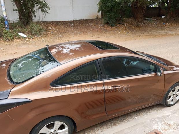 Hyundai Elantra SE Coupe FWD (1.8L 4cyl 6A) 2013 Brown