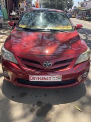 Toyota Corolla LE 4dr Sedan (1.8L 4cyl 4A) 2012 Red for sale