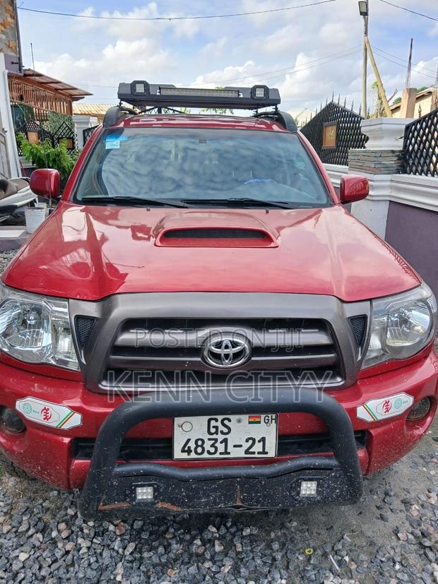 Toyota Tacoma 4dr Access Cab 4WD 6.1 ft. SB (2.7L 4cyl 4A) 2015 Red