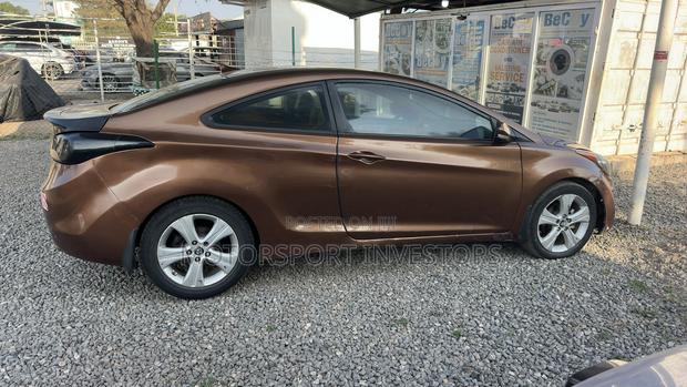 Hyundai Elantra GS Coupe FWD (1.8L 4cyl 6A) 2013 Brown
