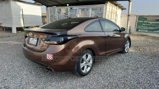 Hyundai Elantra GS Coupe FWD (1.8L 4cyl 6A) 2013 Brown