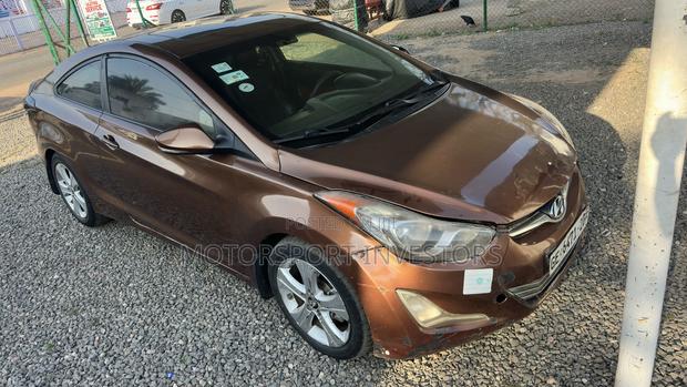 Hyundai Elantra GS Coupe FWD (1.8L 4cyl 6A) 2013 Brown