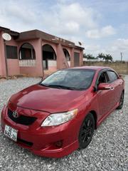 Toyota Corolla Base 4dr Sedan (1.8L 4cyl 5M) 2010 Red for sale