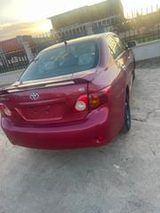 Toyota Corolla Base 4dr Sedan (1.8L 4cyl 5M) 2010 Red for sale