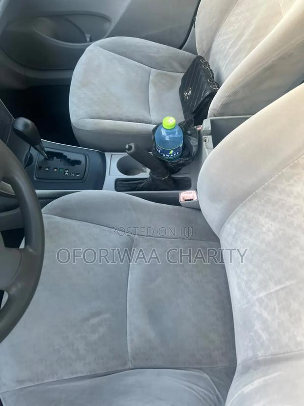 Toyota Corolla Base 4dr Sedan (1.8L 4cyl 5M) 2010 Red