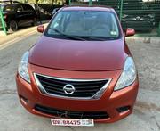 Nissan Versa 1.6 S 4dr Sedan (1.6L 4cyl 4A) 2014 Orange for sale