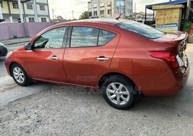 Nissan Versa 1.6 S 4dr Sedan (1.6L 4cyl 4A) 2014 Orange