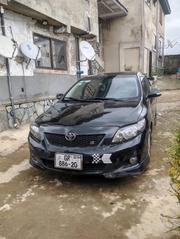 Toyota Corolla Base 4dr Sedan (1.8L 4cyl 5M) 2010 Black for sale
