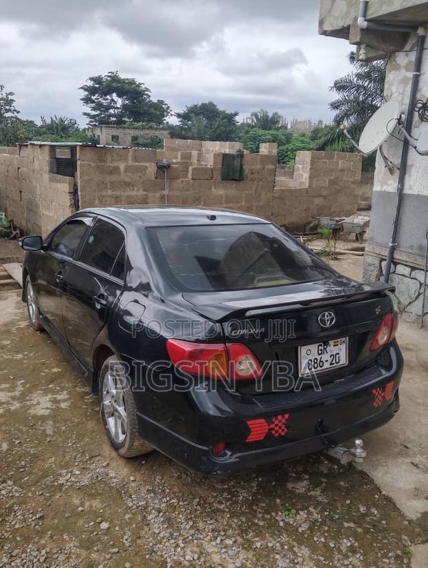 Toyota Corolla Base 4dr Sedan (1.8L 4cyl 5M) 2010 Black