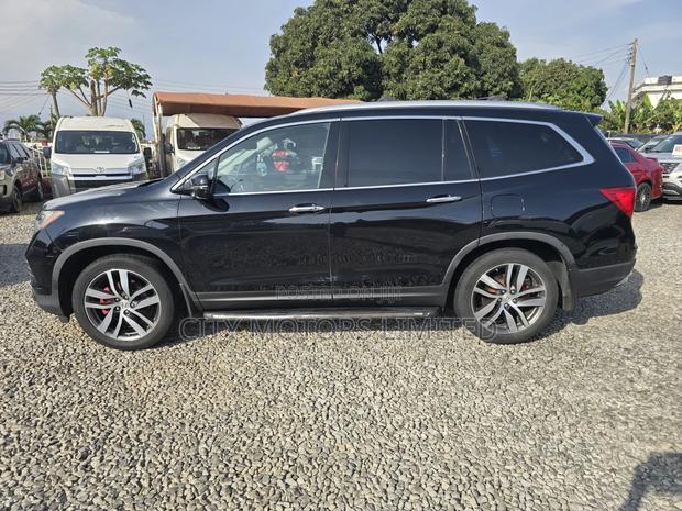 Honda Pilot Touring 4dr SUV 4WD (3.5L 6cyl 9A) 2016 Black