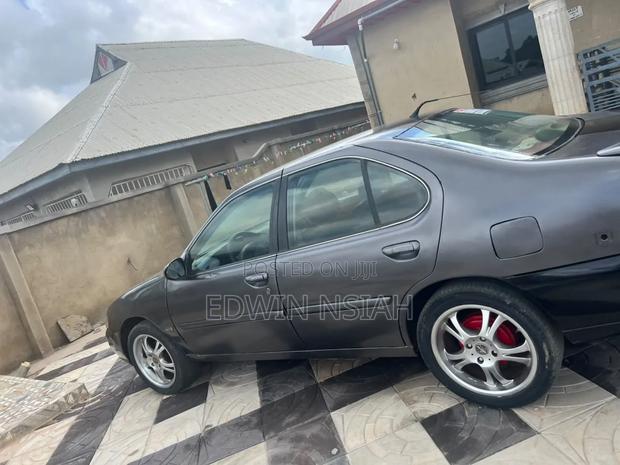 Nissan Altima GXE 1999 Gray
