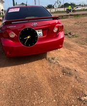 Toyota Corolla Base 4dr Sedan (1.8L 4cyl 5M) 2010 Red for sale